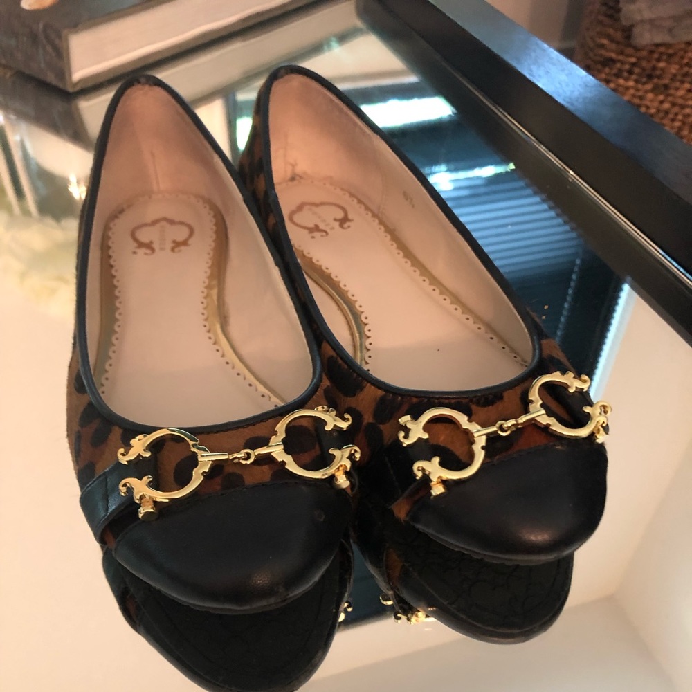 C. Wonder Ballet Flats — Calfskin w/ gold accents